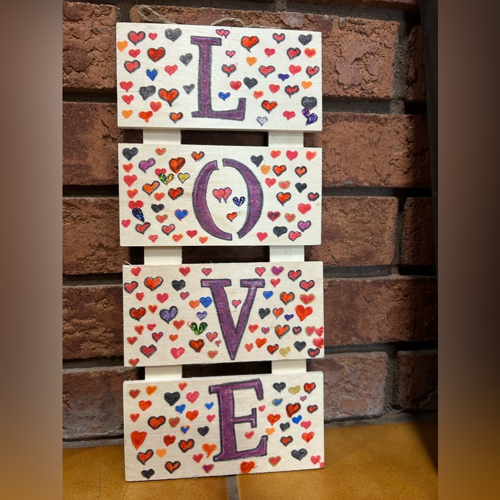 A hand painted love sign by Mary Snoddon Art